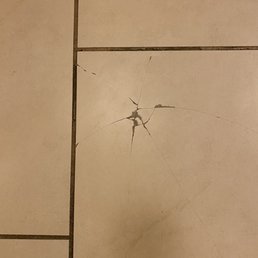 Cracked kitchen floor tile Cracked kitchen floor tile