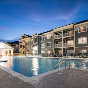 Waterleaf at Neely Ferry - A large swimming pool is surrounded by apartment buildings - Apartments Near Me - Simpsonville, South Carolina Waterleaf at Neely Ferry - A large swimming pool is surrounded by apartment buildings - Apartments Near Me - Simpsonville, South Carolina
