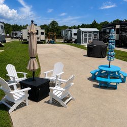 Whispering Pines RV Resort - Lot 52. BYO and rent the lot. Nightly, Weekly and monthly pricing. Picnic Table, Firepit, Grill, umbrella and Adirondack chairs!
