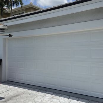 Unity Garage Door - Exterior view of garage door - Garage Door Services Near Me - Coral Springs, Florida Unity Garage Door - Exterior view of garage door - Garage Door Services Near Me - Coral Springs, Florida