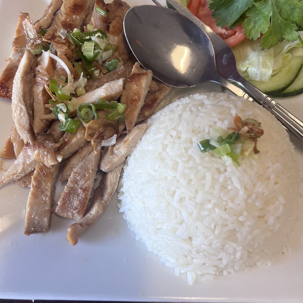 Phoresh - Grilled chicken rice dish, with veggie sauce that was yummy. It comes on the side, so you pour it how you like it. - Vietnamese Near Me - Orlando, Florida Phoresh - Grilled chicken rice dish, with veggie sauce that was yummy. It comes on the side, so you pour it how you like it. - Vietnamese Near Me - Orlando, Florida