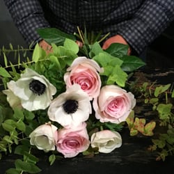 Gorgeous, sweet smelling roses artfully arranged.
