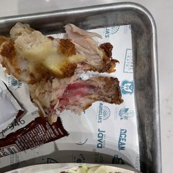 Hot Chicken - Raw chicken drum still clucking.