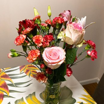 Flowers For A Friend - Arranging the flowers in case. - Florists Near Me - Honolulu, Hawaii Flowers For A Friend - Arranging the flowers in case. - Florists Near Me - Honolulu, Hawaii