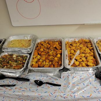 Island Quizine - a variety of food items on a table - Caribbean Near Me - Baltimore, Maryland Island Quizine - a variety of food items on a table - Caribbean Near Me - Baltimore, Maryland