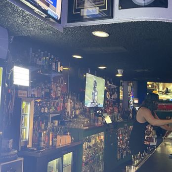 Poor Richard's Cocktails - The MVP right there. Most valuable pourer. - Dive Bars Near Me - Long Beach, California
