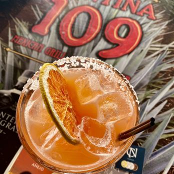 Cantina 109 - a margarita with a slice of orange - Tex-Mex Near Me - Fort Myers, Florida Cantina 109 - a margarita with a slice of orange - Tex-Mex Near Me - Fort Myers, Florida