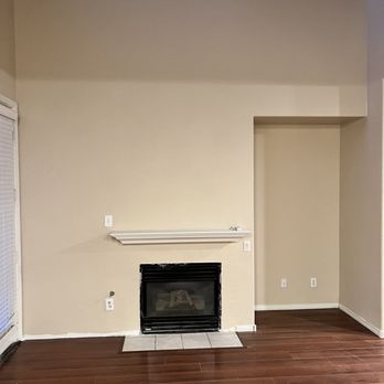 Happy Wall - After Happy Wall completed the work. I even asked them to remove the tiles around the fireplace last minute and was happy to oblige. - Drywall Installation & Repair Near Me