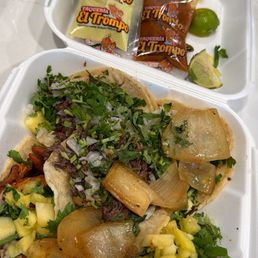 This were the tacos, and as you can see the pineapple is not cooked and the meat is dry.