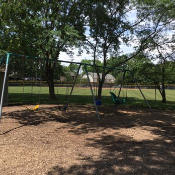 Lions Park - Part of the main playground with a variety of swings - Parks Near Me - Zionsville, Indiana Lions Park - Part of the main playground with a variety of swings - Parks Near Me - Zionsville, Indiana