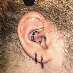 Old Traditions Tattoo Parlor - Had my second lobes and daith done by Spooky all healed and they even helped me change out my jewelry!