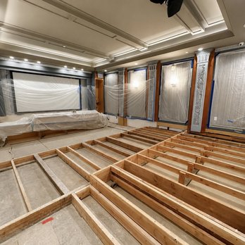 JMS Developers - Structural reframing mid-restoration. Tiered platform being rebuilt after flood damage stripped the room down to bare concrete. - General Contractors Near Me - Los Angeles, California JMS Developers - Structural reframing mid-restoration. Tiered platform being rebuilt after flood damage stripped the room down to bare concrete. - General Contractors Near Me - Los Angeles, California