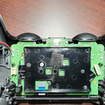 LexIT Systems - A disassembled dualshock 4 ps4 controller - Mobile Phone Repair Near Me