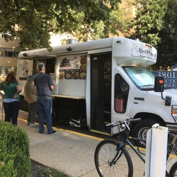 Kick'n Flavorr - a food truck parked on the side of the road - Comfort Food Near Me Kick'n Flavorr - a food truck parked on the side of the road - Comfort Food Near Me