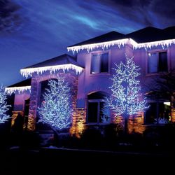Holidynamics - Home decorated with LED Glacier Artisticks and 13' LED Cherry Blossom Trees