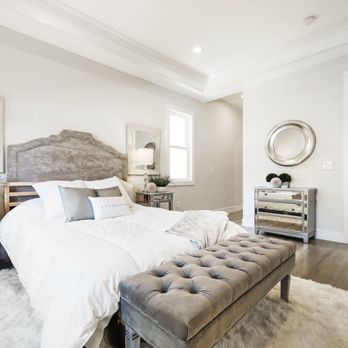 Ali's Construction - a bedroom with a bed and a bench - General Contractors Near Me - San Jose, California