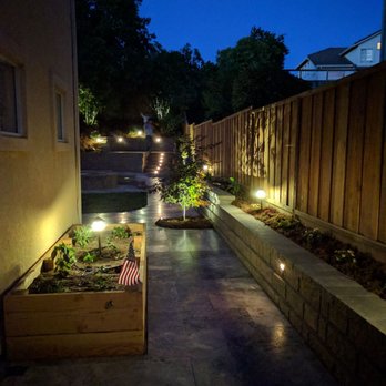 Nine Orange Landscaping - Planter box complete with sprinkler and light! - Landscaping Near Me Nine Orange Landscaping - Planter box complete with sprinkler and light! - Landscaping Near Me