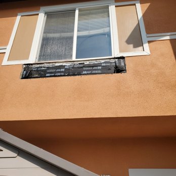 R Home Construction - Planter and wood backing removed - Painters Near Me