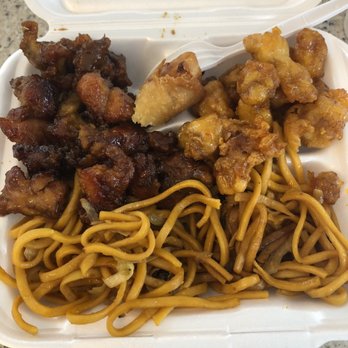 Thai Max - a container of noodles and meat - Thai Near Me - Friendswood, Texas