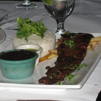 Blend - churrasco - grilled marinated skirt steak w/, white rice, black beans chimichurri sauce & herbed French fries - Latin American Near Me - Long Island City, New York Blend - churrasco - grilled marinated skirt steak w/, white rice, black beans chimichurri sauce & herbed French fries - Latin American Near Me - Long Island City, New York