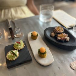 Frenchie - Crème fresh tomato tart with caviar, crab puff with melon ball, and beef tartare with apricot
