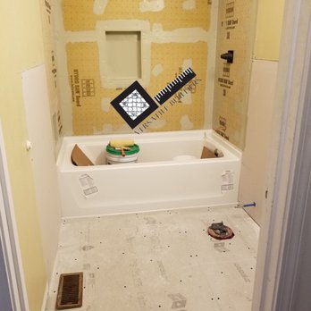 Versatile Builders - During! New tub and underlayment. - Tiling Near Me - Quincy, Massachusetts