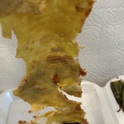 La Hacienda del Sazon - Foot long crepe-thin egg skin wrapped around the relleno,not appetizing.