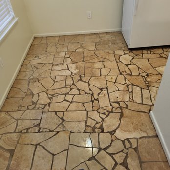 Cgd Services - a kitchen floor with cracked tiles - General Contractors Near Me - Lubbock, Texas Cgd Services - a kitchen floor with cracked tiles - General Contractors Near Me - Lubbock, Texas
