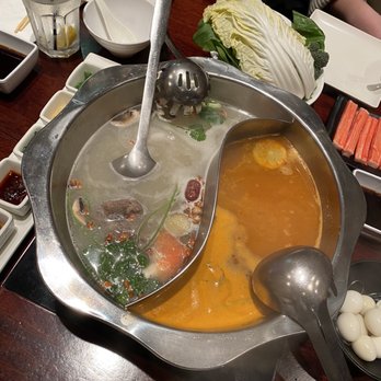 Q Restaurant - Japanese Tonkotsu Broth (left). Hot and Sour Tomyum Broth (right). - Chinese Near Me - Boston, Massachusetts Q Restaurant - Japanese Tonkotsu Broth (left). Hot and Sour Tomyum Broth (right). - Chinese Near Me - Boston, Massachusetts