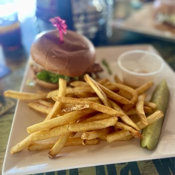 Jimmy Buffets Margaritaville Restaurant - Blackened Chicken Sandwich and fries - New American Near Me - St. Thomas, Virgin Islands Jimmy Buffets Margaritaville Restaurant - Blackened Chicken Sandwich and fries - New American Near Me - St. Thomas, Virgin Islands