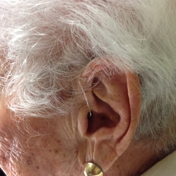 Labyrinth Audiology - Hearing aids have changed dramatically. Can you find the hearing aid on this image? - Audiologist Near Me - Boca Raton, Florida Labyrinth Audiology - Hearing aids have changed dramatically. Can you find the hearing aid on this image? - Audiologist Near Me - Boca Raton, Florida