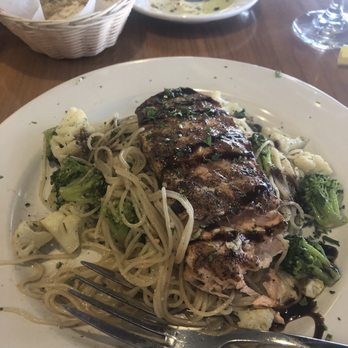 Mezza Luna - Roasted Salmon with garlic spaghetti noodles & broccoli - Italian Near Me - Smyrna, Georgia Mezza Luna - Roasted Salmon with garlic spaghetti noodles & broccoli - Italian Near Me - Smyrna, Georgia