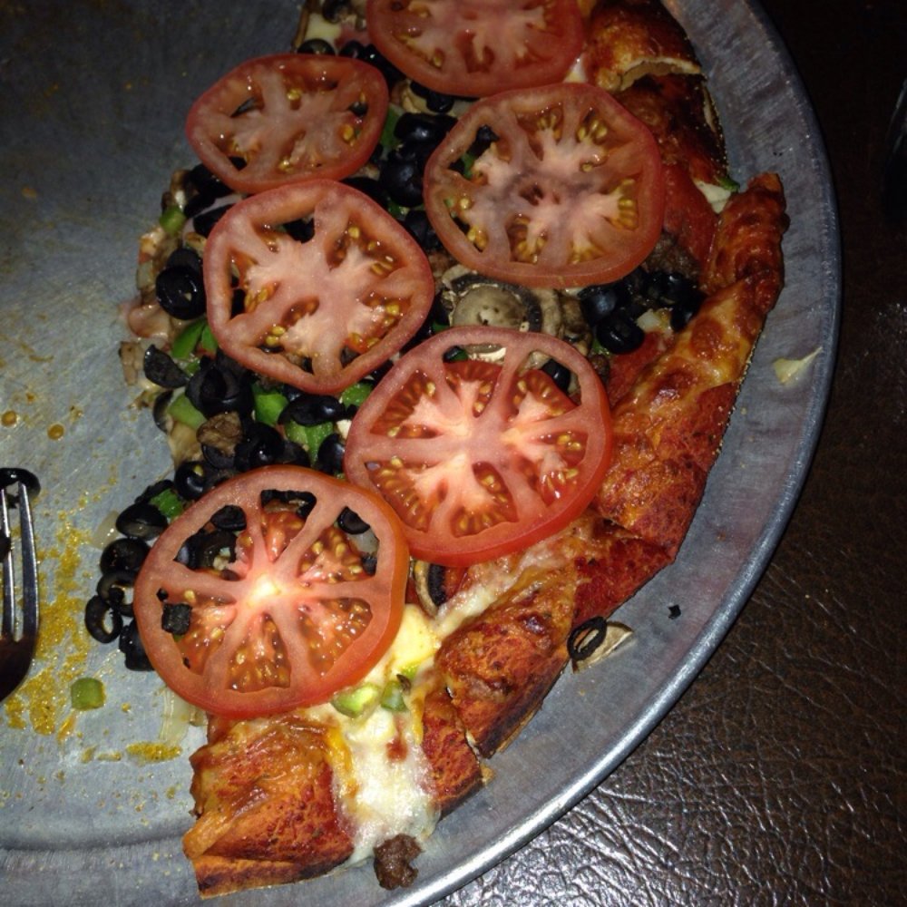 Pizza Vendor - Our Deluxe pizza (half eaten) - Pizza Near Me - Scappoose, Oregon Pizza Vendor - Our Deluxe pizza (half eaten) - Pizza Near Me - Scappoose, Oregon