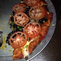 Pizza Vendor - Our Deluxe pizza (half eaten)