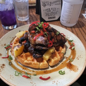 Alfie's - Jerk chicken and cornbread waffle - New American Near Me - New York, New York Alfie's - Jerk chicken and cornbread waffle - New American Near Me - New York, New York
