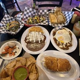their famous tamales, el pastor tacos, Barbacoa tacos, a burrito, chilaquiles, and their enchiladas. their famous tamales, el pastor tacos, Barbacoa tacos, a burrito, chilaquiles, and their enchiladas.