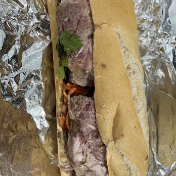 Tran An - Cold, stale, soggy banh mi.. with 2 chunks of meat just thrown in it. - Vietnamese Near Me - Miami, Florida Tran An - Cold, stale, soggy banh mi.. with 2 chunks of meat just thrown in it. - Vietnamese Near Me - Miami, Florida