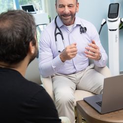 Intellectual Medicine - Dr. Stephen Petteruti with a patient in Fort Lauderdale, FL