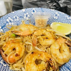 Hit The Spot Lao Street Food - Pad Thai noodle lovers would enjoy our bold sweet & tangy flavor pad Kua mee.