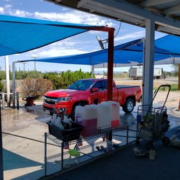 Hand wash in the shade.$20 Hand wax +$30. WELL WORTH IT!