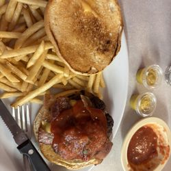Bacon cheeseburger, fries, ketchup, & amazing salsa that is actually reminiscent of El Paso & La Botana in Brownwood.