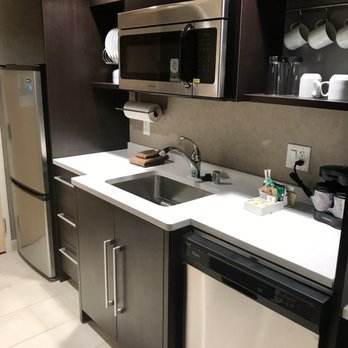 Home2 Suites by Hilton - Fridge, microwave, sink, and dishwasher. - Hotels Near Me - Livermore, California Home2 Suites by Hilton - Fridge, microwave, sink, and dishwasher. - Hotels Near Me - Livermore, California