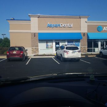 Aspen Dental - Ypsilanti, MI - Front entrance. Aspen Dental is located in the extended parking lot of the Meijers, and JoAnn Fabrics Ypsilanti on Carpenter Road. - General Dentistry Near Me - Ypsilanti, Michigan