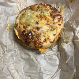 A delicious bagel that should've been cut A delicious bagel that should've been cut