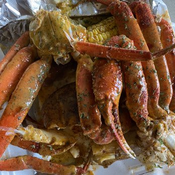 Mr3s Crabpot Seafood Takeout - Garlic Parmesan crab legs with turkey sausage and eggs - Seafood Near Me - Charlotte, North Carolina Mr3s Crabpot Seafood Takeout - Garlic Parmesan crab legs with turkey sausage and eggs - Seafood Near Me - Charlotte, North Carolina