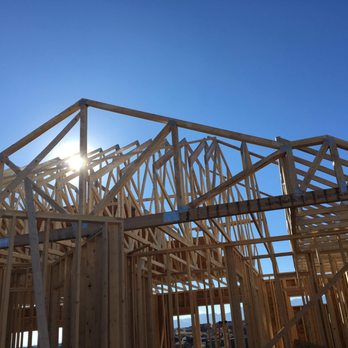 Hodges Home Builders - House frame at sunset. - General Contractors Near Me - Peyton, Colorado Hodges Home Builders - House frame at sunset. - General Contractors Near Me - Peyton, Colorado