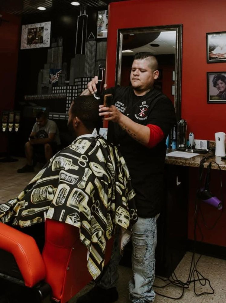 Vazquez Barbershop & Salon Logo