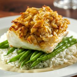 Burtons Grill & Bar - Crab Crusted Haddock: crab cake stuffing, lemon butter sauce, herbed jasmine rice, seasonal vegetable