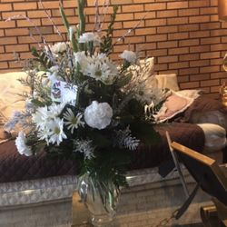 Sid's Flowers & More - New Year's flowers. Ordering from out of state but I can always trust a local florist close to Grandpa.