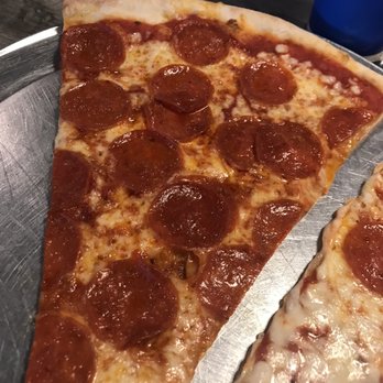 Homeslice NY Style - One of the monster pepperoni slices - Pizza Near Me - Greensboro, North Carolina